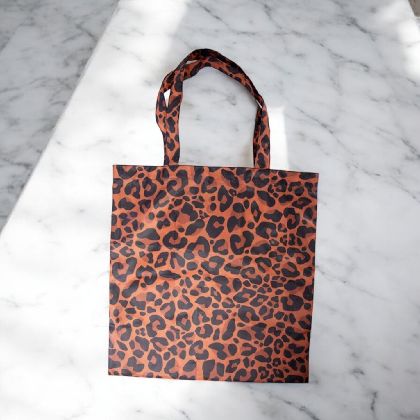 is GIFT Reusable Foldable Shopper Bag - Leopard Print